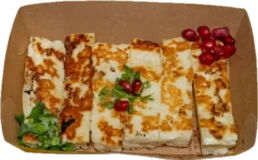 Halloumi street food wrap with grilled cheese, fresh vegetables, and herbs – Utopia Mercato London